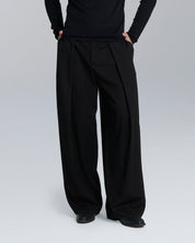 Pantalone wide fit con pieghe