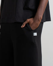 Pantalone in tuta a taglio vivo