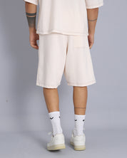 Bermuda in tuta con impunture