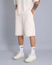 Bermuda in tuta con impunture