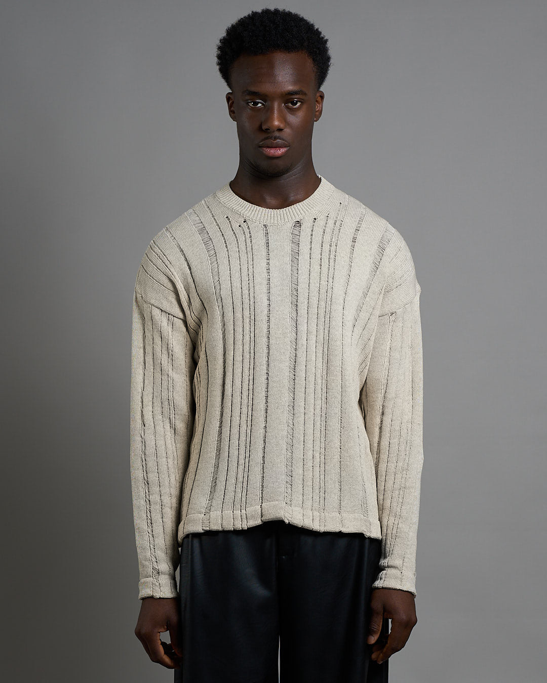 Maglia cropped in filo fluttuante