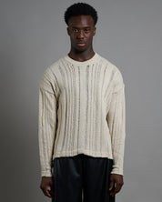 Maglia cropped in filo fluttuante