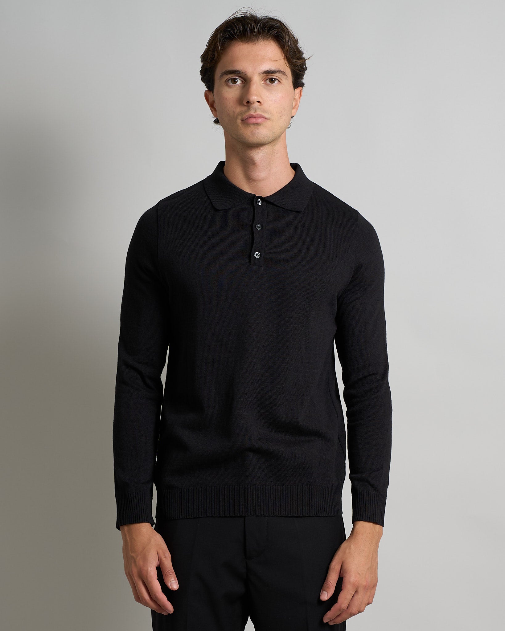 Polo con bottoni manica lunga