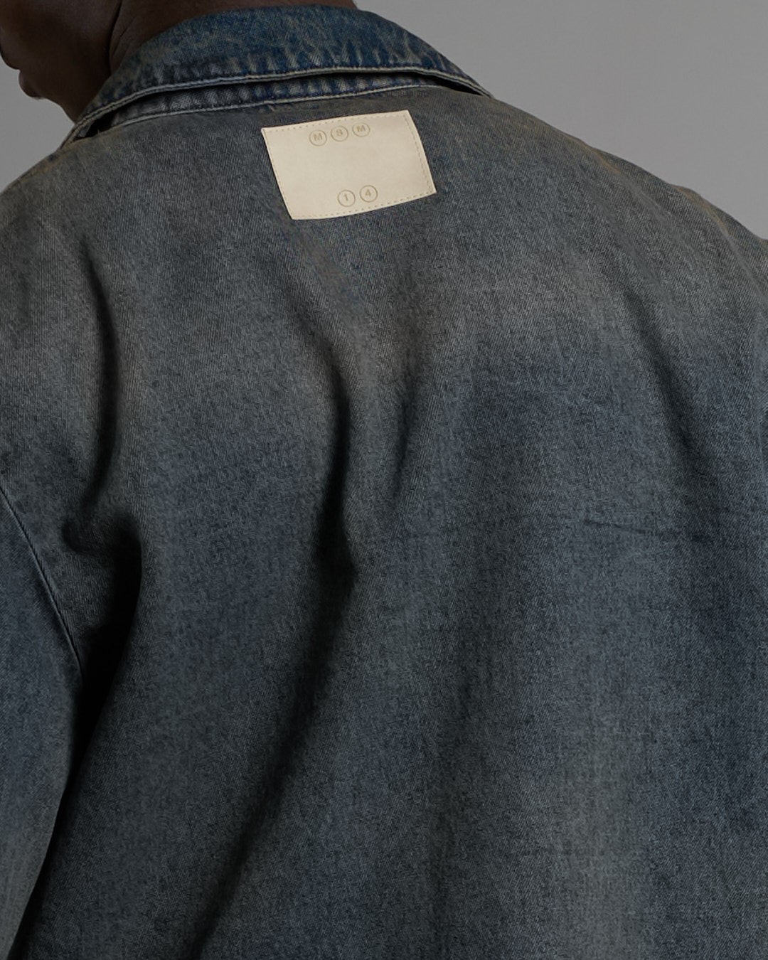 Giacca in denim sabbiato cropped