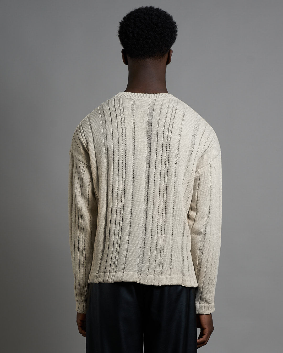 Maglia cropped in filo fluttuante