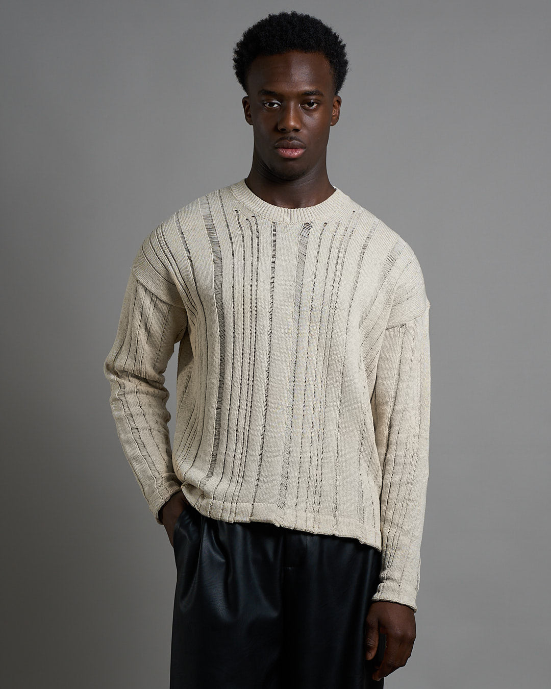 Maglia cropped in filo fluttuante