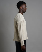 Maglia cropped in filo fluttuante