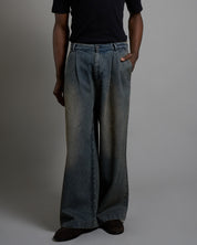 Pantalone strutturato in denim sabbiato