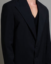 Giacca cropped con finiture sfilacciate