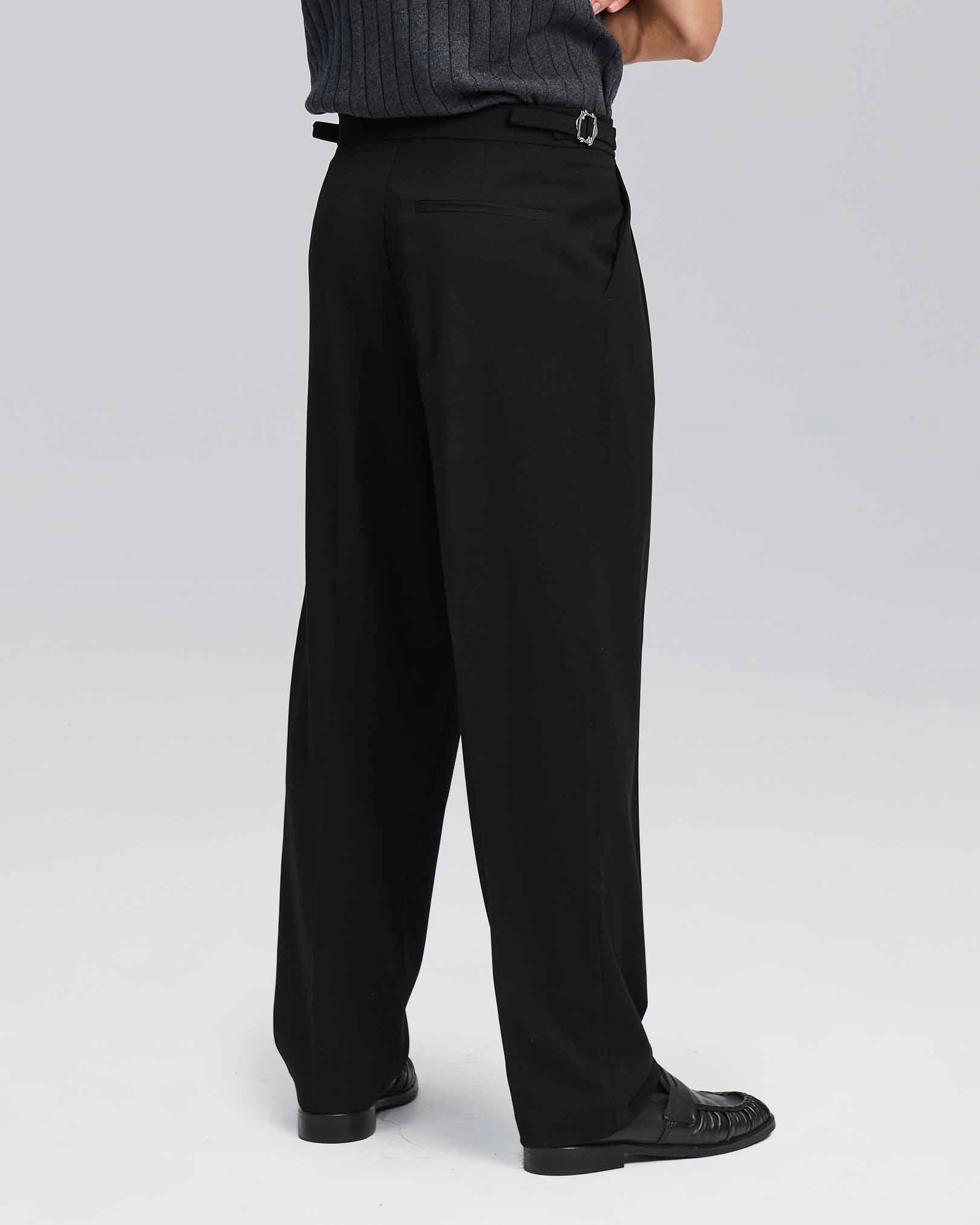 Pantalone wide fit con fibbiette