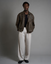 Giacca in pelle cropped con chiusure a scatto