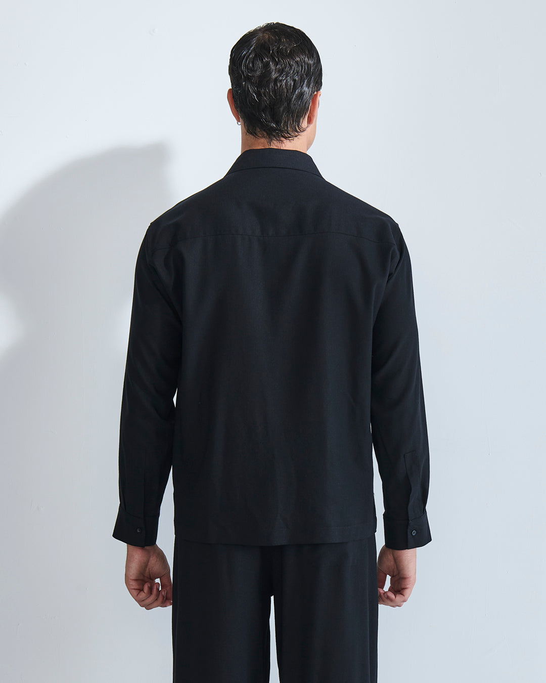 Camicia in lino con pieghe