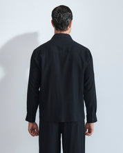 Camicia in lino con pieghe