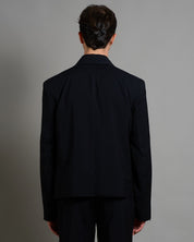 Giacca cropped con finiture sfilacciate